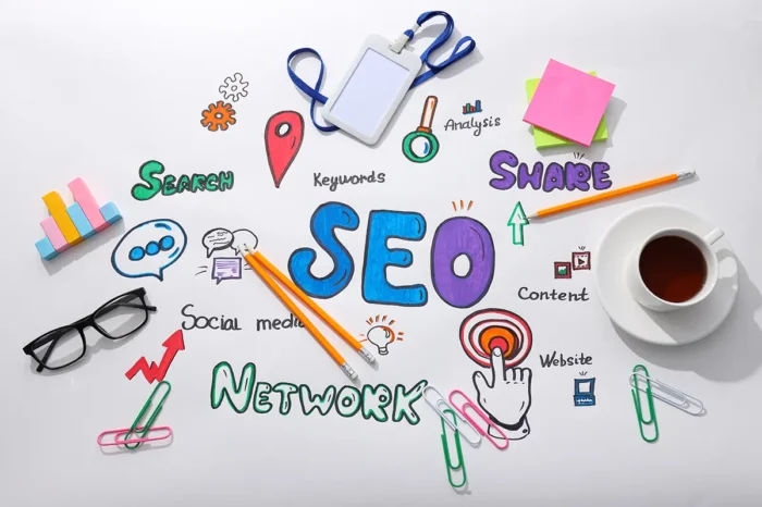 drawings-glasses-cup-stationery-white-background-top-view